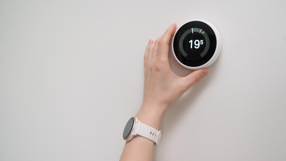 Un thermostat affichant 19.5°