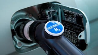 Close up of a hydrogen nozzle in a service station.