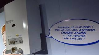 Picture of a water heater with a notice recommending that it be serviced annually.