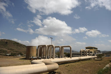 The Olkaria geothermal plat in central Kenya extracts heat from some 2 km below the Earth's surface to generate electricity.